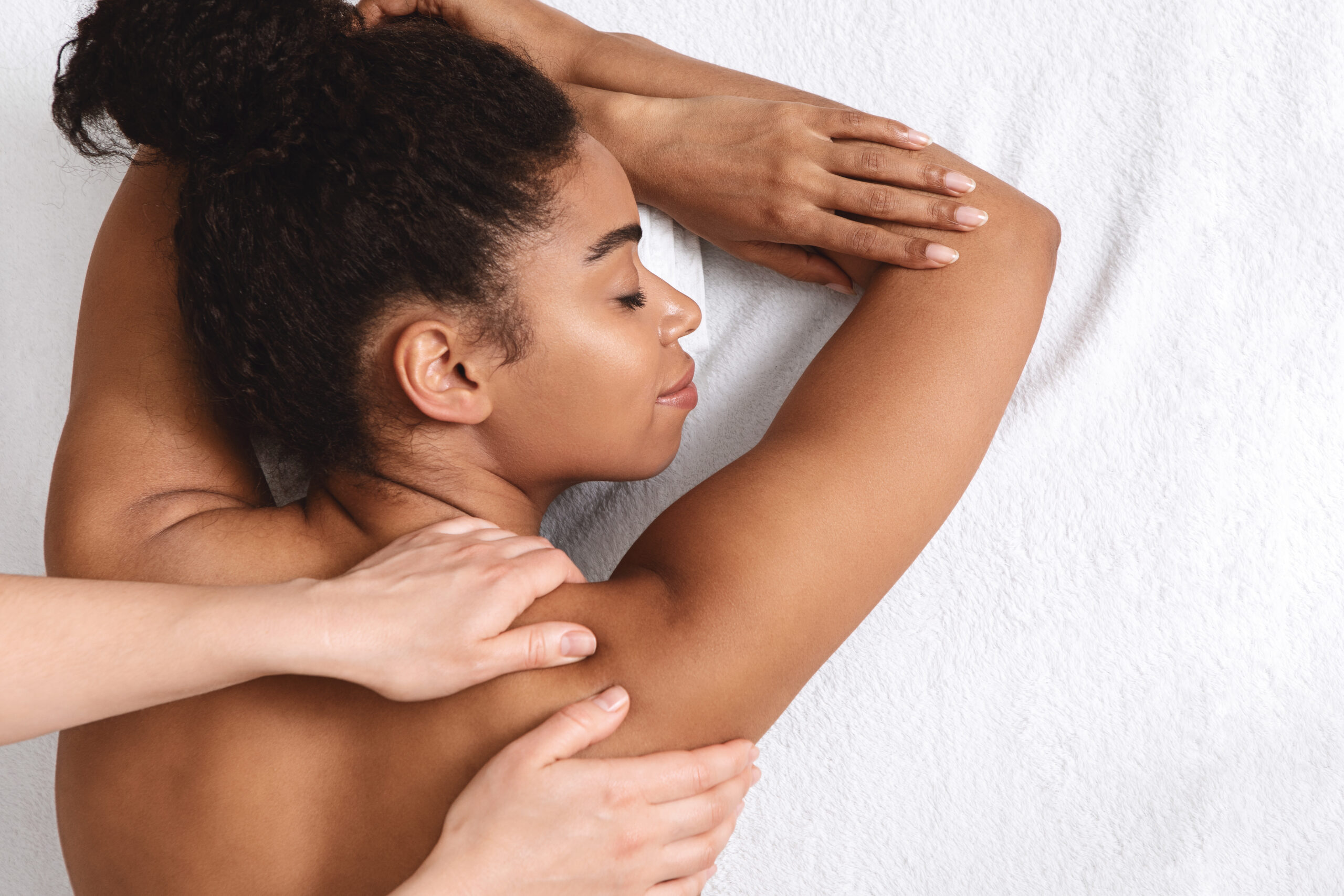 women taking massage therapy