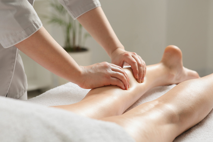 Woman receiving Reflexology Massage